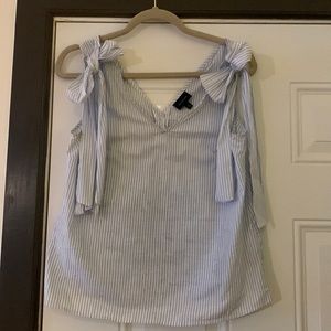 Target sleeveless blouse, blue and white striped, button back detail.